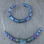 titan armring +halsring vriden norrsken