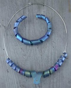 titan armring +halsring vriden norrsken